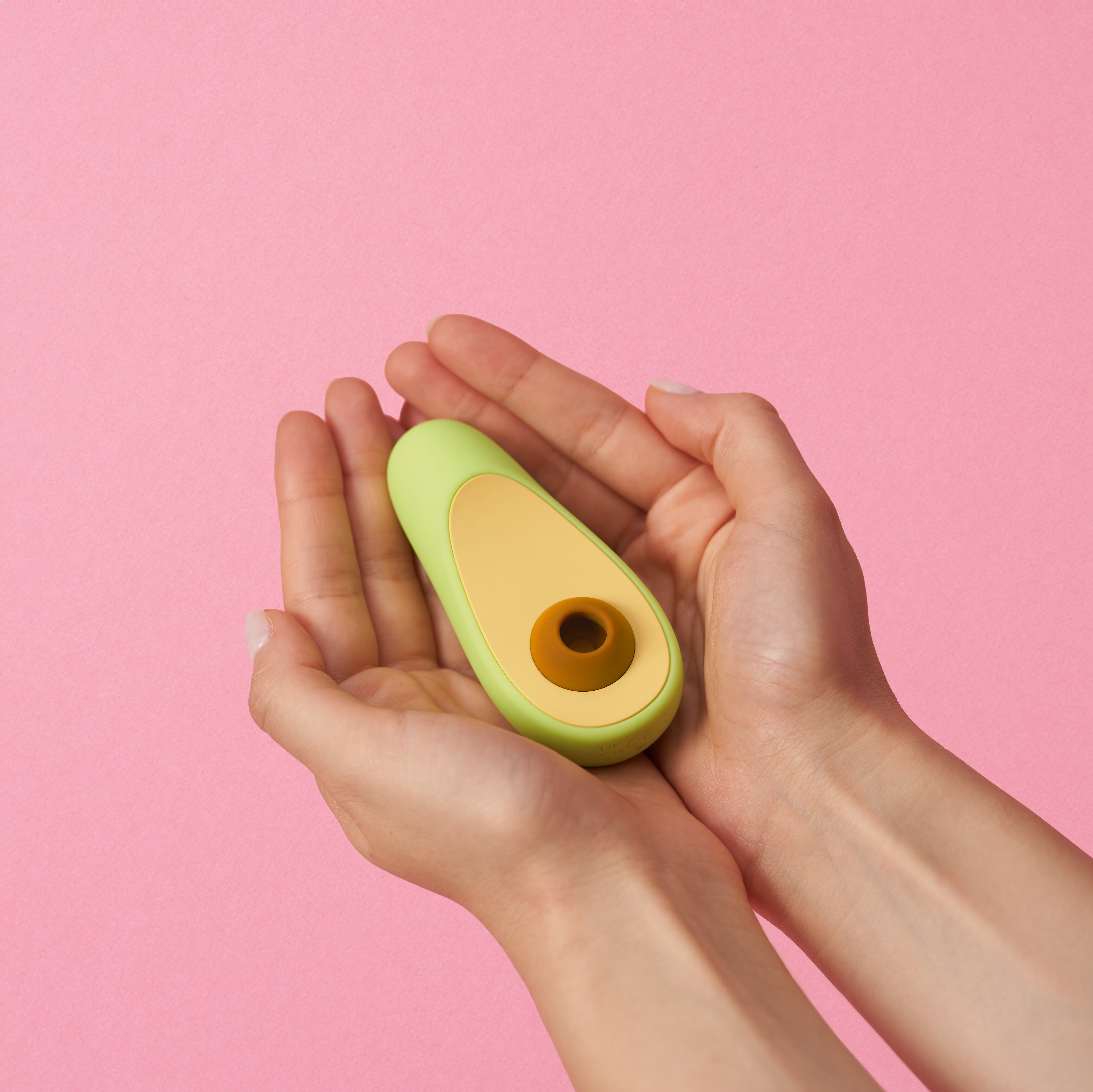 Avocado-Vibrator — in der Hand