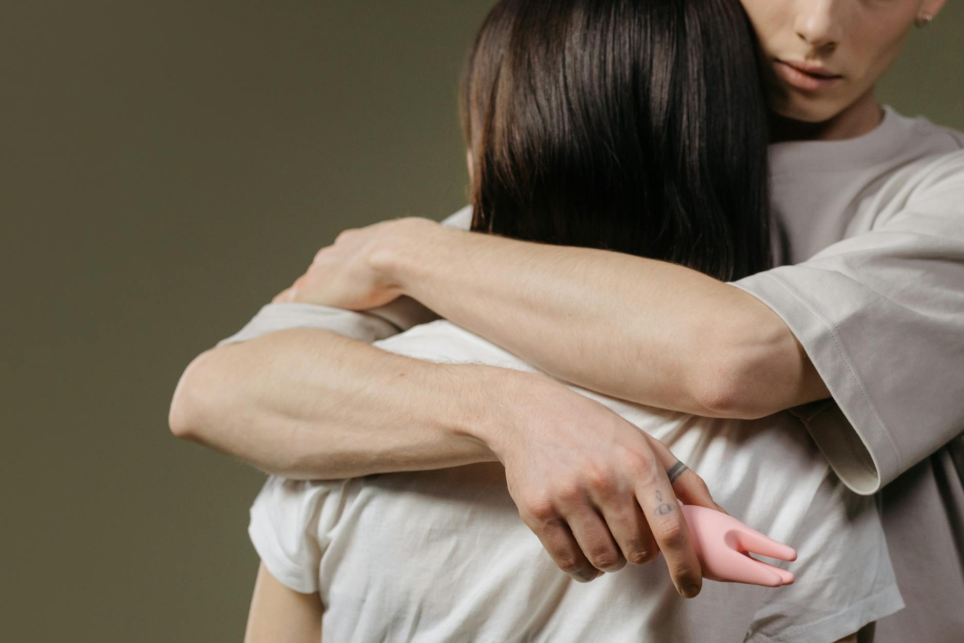 Close-up of a couple embracing, highlighting intimacy and connection.